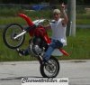 1handedwheelieondirtbike.jpg
