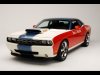 2010-Sox-and-Martin-Hemi-Cuda-by-Mr-Norms-Garage-Front-Angle-1280x960.jpg