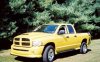 050057_mops_06z+2004_Dodge_Ram_4x4_Rumble_Bee_SLT+Front_Drivers_Side_View.jpg