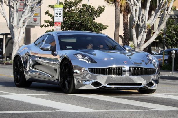 Justin+Bieber+and+Selena+Gomez+take+Justin's+new+chrome+customed+Fisker+Karma+out+for+a+drive